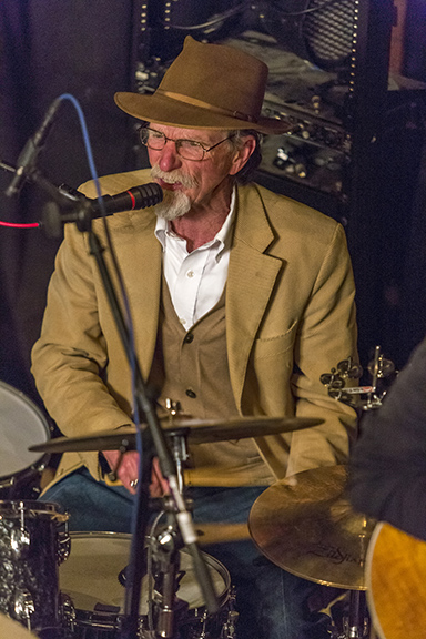 Ned Ashbaugh on drums